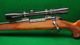 Weatherby MK V Deluxe Left Hand 7mm Wby Mag Bolt Action Rifle - 1 of 6