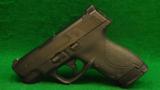 Smith & Wesson Model M&P Shield Caliber 40 S&W Pistol - 1 of 2
