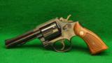 Smith & Wesson Model 10HB Caliber 38 Special DA Revolver - 1 of 2