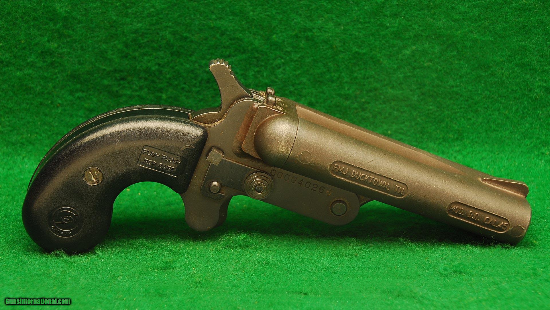 Cobray Model DD Caliber 45/ 410 Double Barrel Pistol.