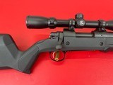 Remington 700 .223
with Remington 4-12x40 scope. - 8 of 15