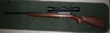 Thompson Center 22 Classic
cal .22lr
22 1/8" barrel
High Condition
with Bushnell 3-9x40 scope - 3 of 4