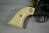 Colt SAA, .45 colt, 4 3/4", Ivory Grips, Class B Engraving, Black Power Frame, New in box - 2 of 5