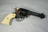 Colt SAA, .45 colt, 4 3/4", Ivory Grips, Class B Engraving, Black Power Frame, New in box - 1 of 5