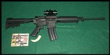 Bushmaster Carbon 15 5.56 - Image 1 of 2