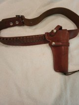 very rare Smith and Wesson leather gun belt and holster 38cal and hunter #275 rifle cartridge belt 30 cal - 1 of 7