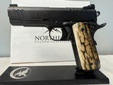 NIGHTHAWK CUSTOM BOB MARVEL COMMANDER w/IOS
.45acp PISTOL - 2 of 4
