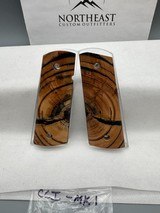 CUSTOM CROSS-CUT MAMMOTH IVORY 1911 PISTOL GRIPS - Image 1 of 1