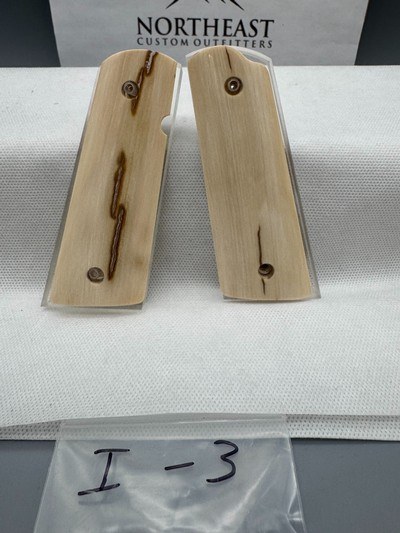 CUSTOMMAMMOTH IVORY 1911 PISTOL GRIPS - Image 1 of 1