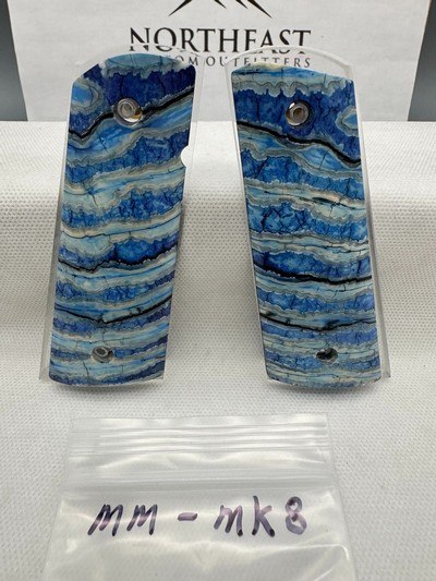 CUSTOM MAMMOTH MOLAR 1911 PISTOL GRIPS - Image 1 of 1