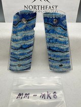 CUSTOM MAMMOTH MOLAR 1911 PISTOL GRIPS - Image 1 of 1