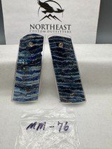 CUSTOM MAMMOTH MOLAR 1911 PISTOL GRIPS - Image 1 of 1