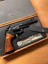 Smith & Wesson Model 29-3 44 Magnum Revolver.
Mint - never fired - Dirty Harry original with presentation case and mint tools