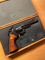 Smith & Wesson Model 29-3 44 Magnum Revolver.
Mint - never fired - Dirty Harry original with presentation case and mint tools - 11 of 11