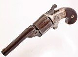 ANTIQUE RARE MOORE'S PATENT FIREARMS CO. 32 TEAT FIRE CAL. 6 RD ENGRAVED REVOLVER.