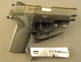 Smith and Wesson 910 9mm Pistol w/ Holster & mag - 1 of 10