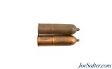 Lot of Two 32 Caliber National Teat Fire Cartridges Round & Flat - 1 of 3