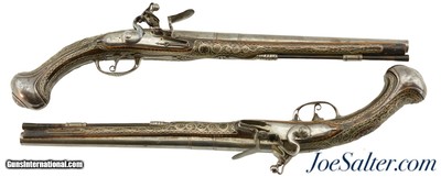 Interesting Pair of Highly Embellished 20-Bore Pistols Purportedly by Robert Delany ca. 1720