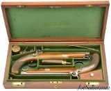 Cased Pair of British Back-Action Traveling Pistols by Thomas Tipping