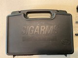Sig Arms SP2340 pistol with Swiss-made Frame, Night Sights, two NEW barrels .357Sig .40S&W and 4 magazines plus NEW spare parts - 10 of 10