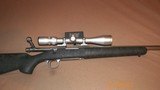 Remington 700 LVSF 223/Bushnell Elite 4200 Scope - 1 of 12
