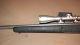 Remington 700 LVSF 223/Bushnell Elite 4200 Scope - 10 of 12