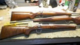 3 Remington Model 7 Walnut Stainless-223/243/6mm