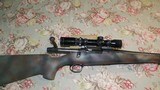 Remington Model 7 223 Blued/Synthetic/Burris Scope - 1 of 13