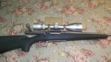 Remington Model 7 243 Win. Stainless/Synthetic/Simmons AETEC Scope