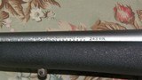 Remington Model 7 243 Win. Stainless/Synthetic/Simmons AETEC Scope - 10 of 13