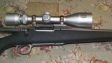 Remington Model 7 243 Win. Stainless/Synthetic/Simmons AETEC Scope - 3 of 13