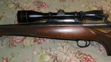 Remington Model 7 260 Rem. Walnut/Blued Barrel/Leupold Scope - 8 of 14