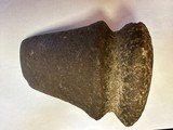 Early man full groove stone axe.