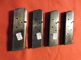Four vintage 7 round 1911 mags