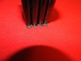 Four vintage 7 round 1911 mags - 7 of 8