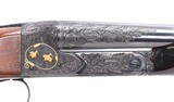 Winchester Model 21 20 gauge..game scene engraved and gold inlaid by Master Bill Mains