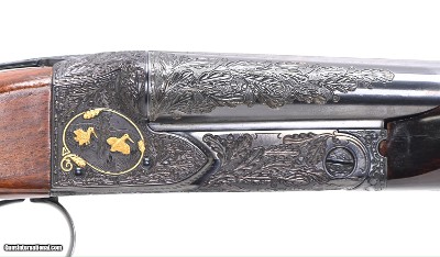 Winchester Model 21 20 gauge..game scene engraved and gold inlaid by Master Bill Mains