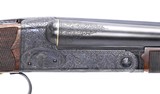 Winchester (CSMC) model 21 custom 3-bbl set.
21-5 engraved
20, 20, & 28 gauges - 11 of 19