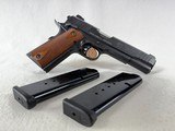 Taurus PT1911 Government Model 1911 – .45 ACP (April 2008) | Like New, Wood Grips - Image 1 of 13
