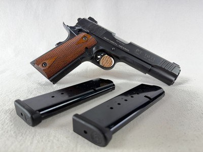 Taurus PT1911 Government Model 1911 – .45 ACP (April 2008) | Like New, Wood Grips - Image 1 of 13