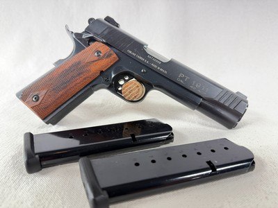 Taurus PT1911 Government Model 1911 – .45 ACP (August 2007) | Like New, Wood Grips - Image 1 of 11