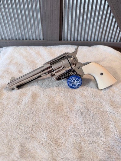 1965 Colt SAA, 45, 4 3/4 barrel, Nickel, Ivory, beautiful!