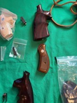 Smith and Wesson grips and leather holsters - 4 of 6