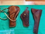 Smith and Wesson grips and leather holsters - 2 of 6