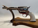 Colt Single Action Army (SAA) Engraved European Edition 9mm w/ 5 1/2” Barrel and Real Ivory Grips - Image 1 of 19