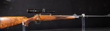 Factory Game Scene Engraved Mauser M03 .404 Jeffery Takedown Rifle | Swarovski Habicht | Certified Safari-Ready™ - Image 1 of 14
