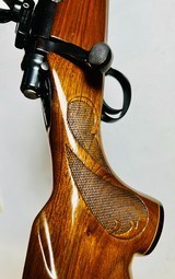 Remington Model 700, 7mm bolt-action rifle, 24