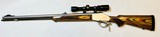Knight Revolution .50 Caliber Muzzleloader – Laminated Stock w/ Scope - 1 of 15