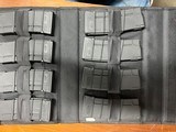 (8) AR15 Magazines and portfolio holder