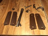 1911 Colt 45 Ithica parts - 1 of 2